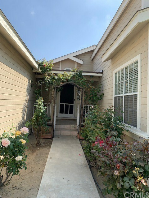 Property Photo: 140 W Pioneer Avenue 57 CA 92374