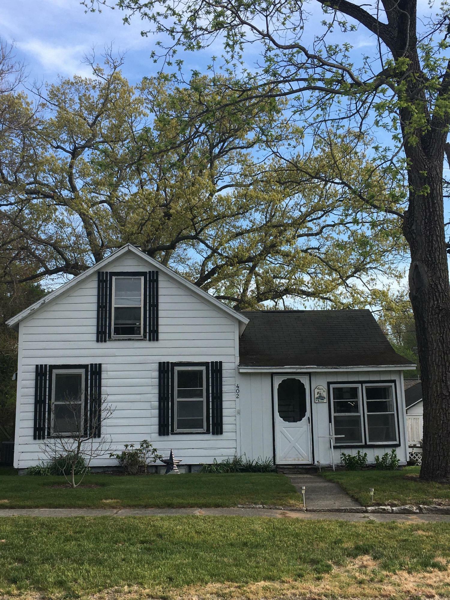 Property Photo:  402 Peach Street  MI 49415 