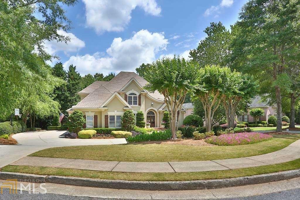 Property Photo:  7070 Laurel Oak Drive  GA 30024 