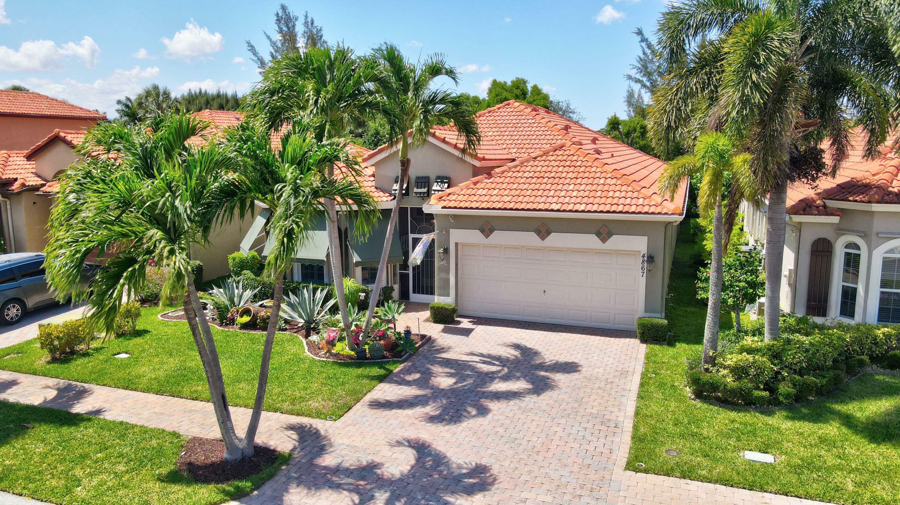 Property Photo:  4867 Gateway Gardens Drive  FL 33436 