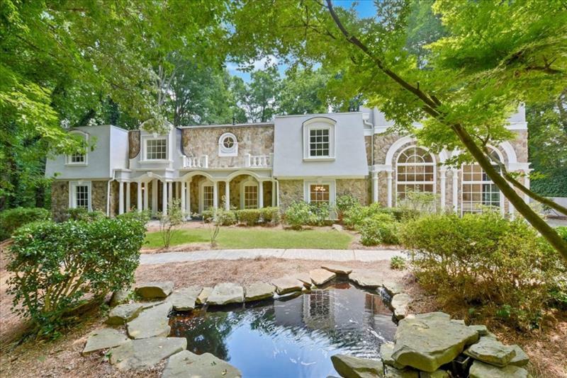 Property Photo: 8970 Huntcliff Trace GA 30350