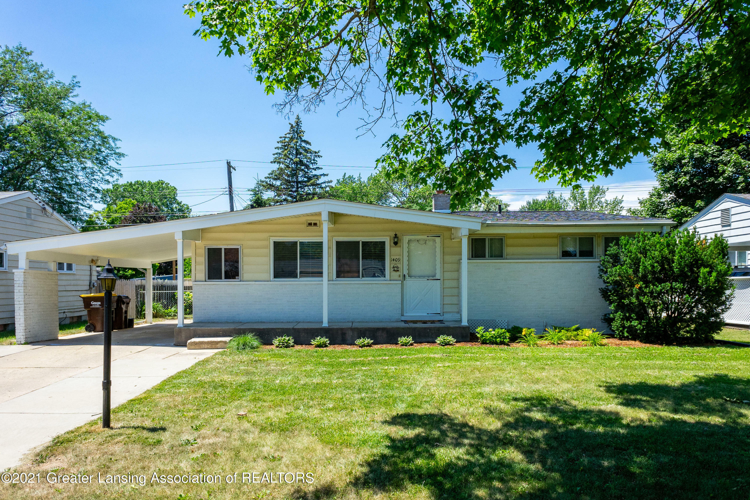 Property Photo:  1409 Weber Drive  MI 48912 