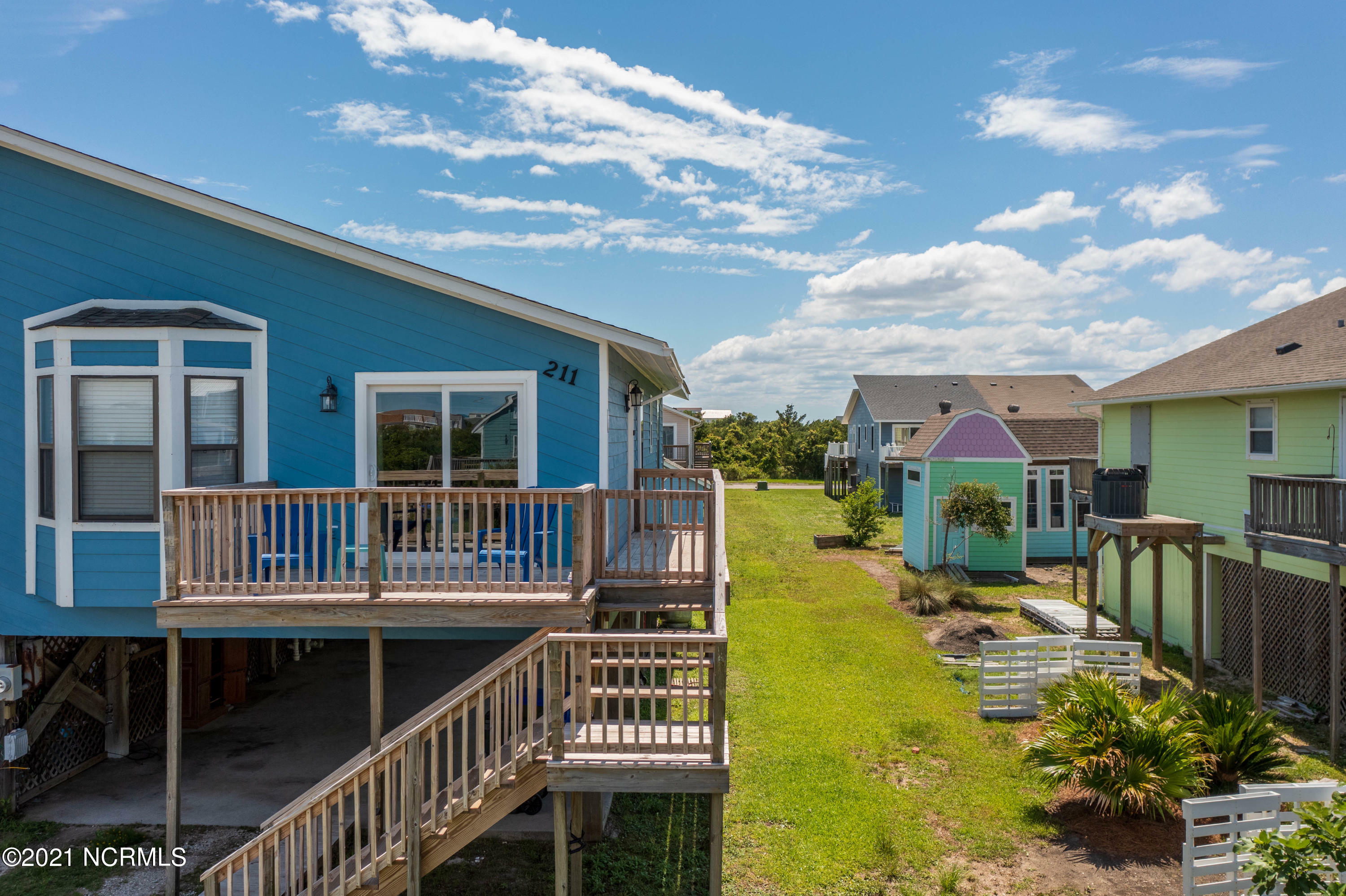 Property Photo:  211 Coastal Drive  NC 28460 