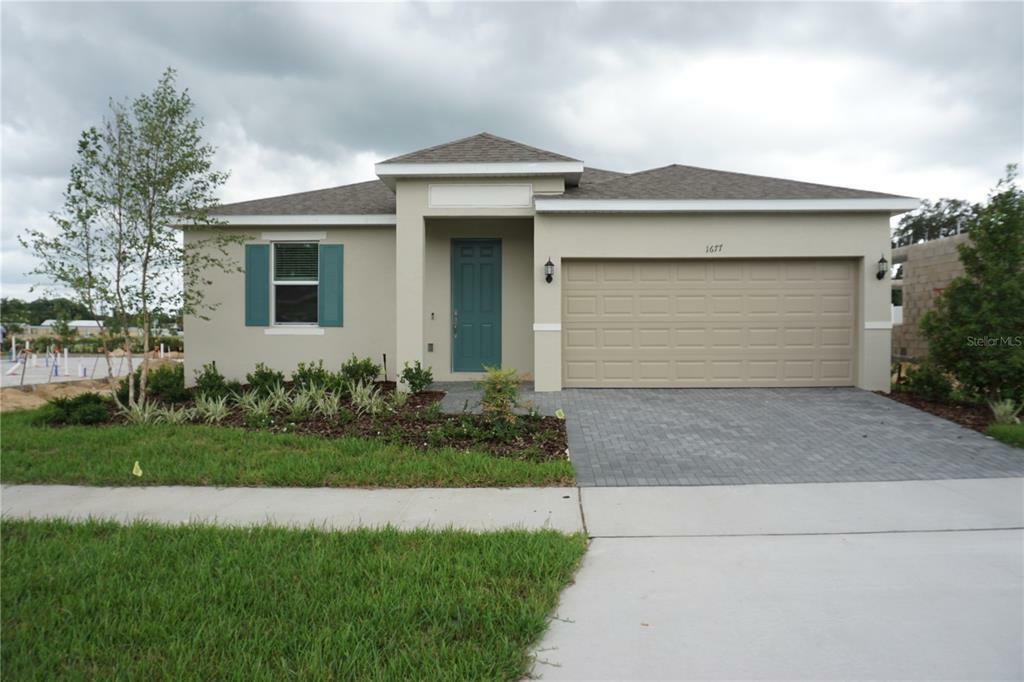 Property Photo:  1677 Way Of Peace Lane  FL 34753 