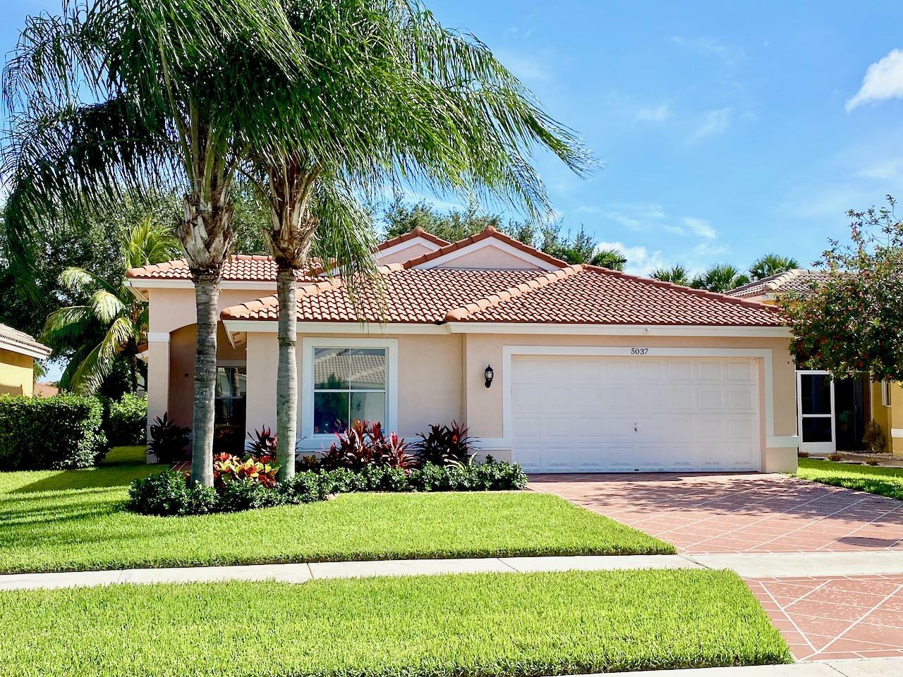 Property Photo:  5037 Prairie Dunes Village Circle  FL 33463 