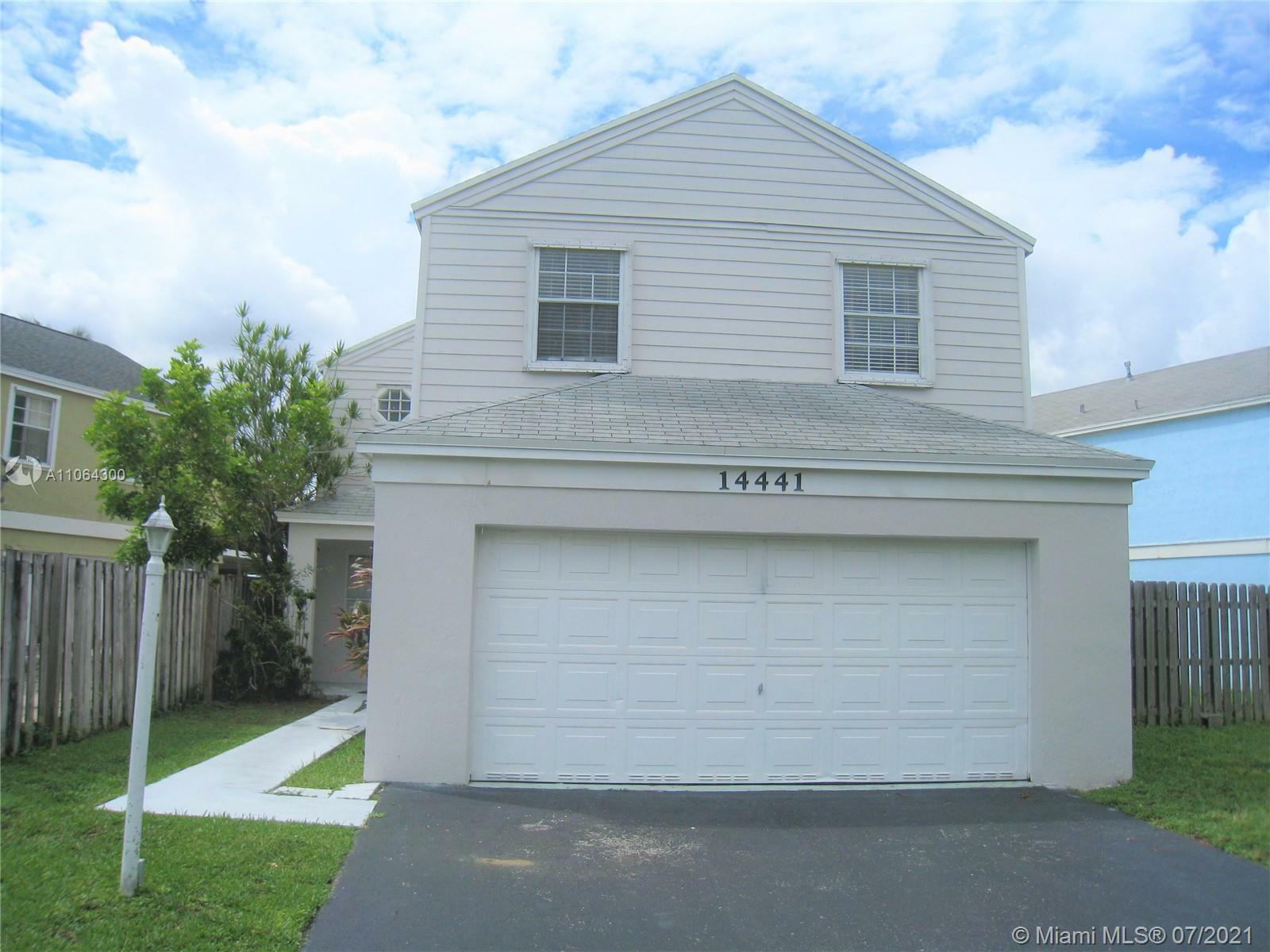 Property Photo:  14441 SW 124th Pl  FL 33186 