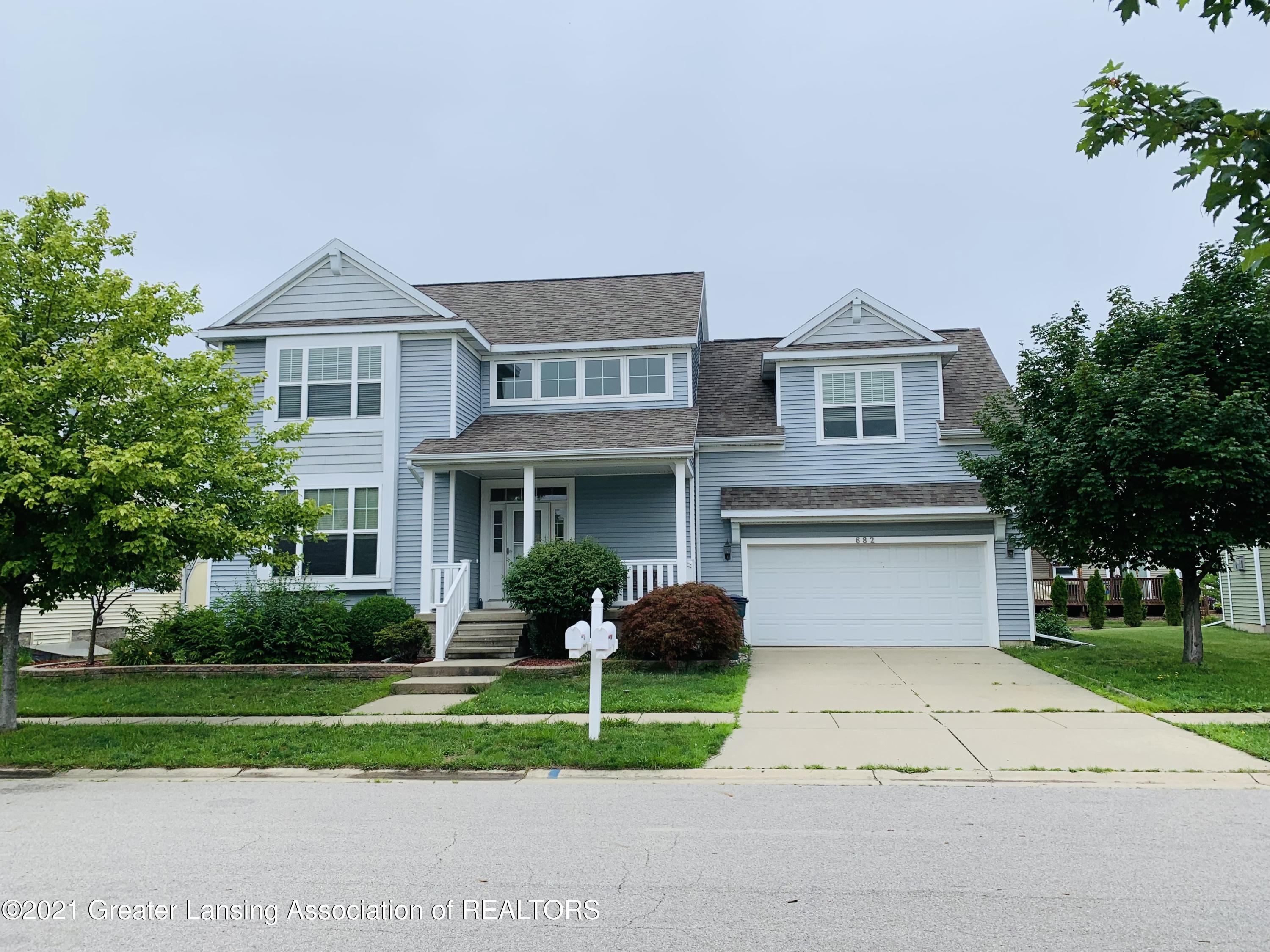 Property Photo: 682 Willet Way MI 48823
