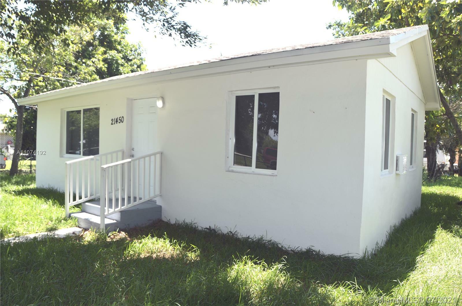 Property Photo:  21450 SW 120th Ave  FL 33177 