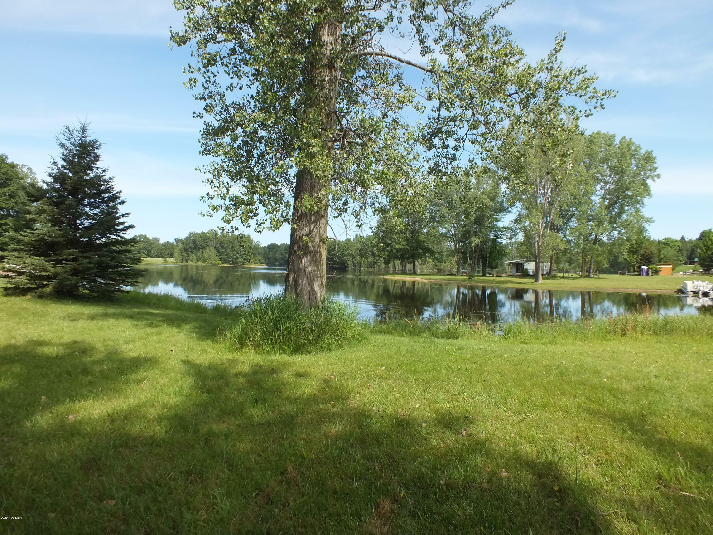 Property Photo:  W Village Road  MI 49436 