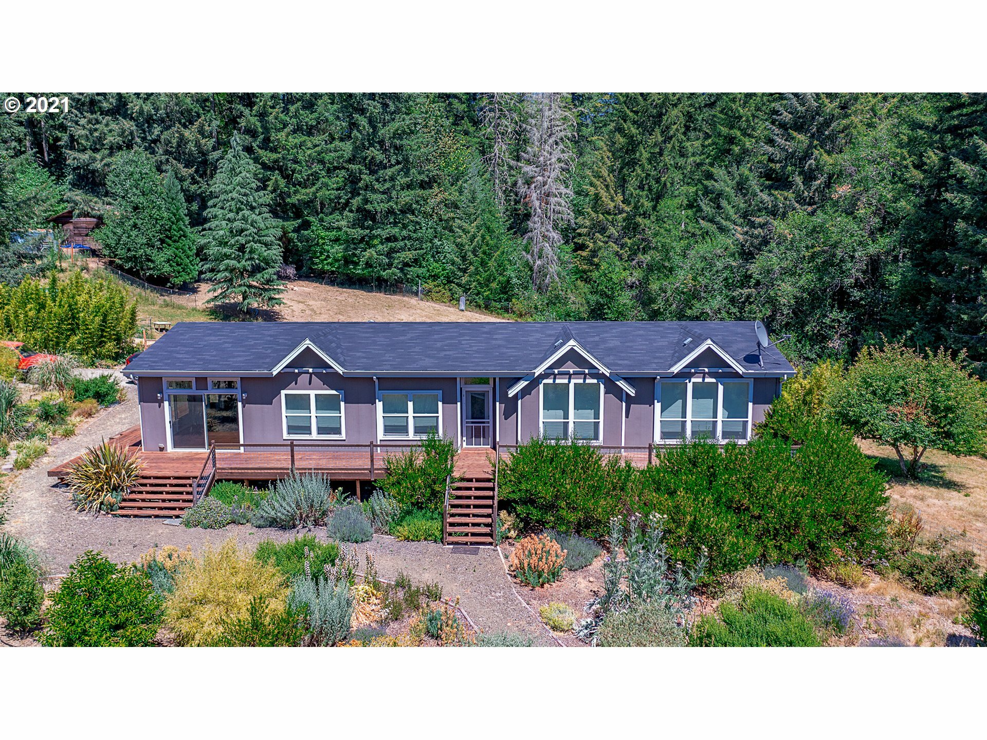 Property Photo:  12715 Upper Smith River Rd  OR 97435 