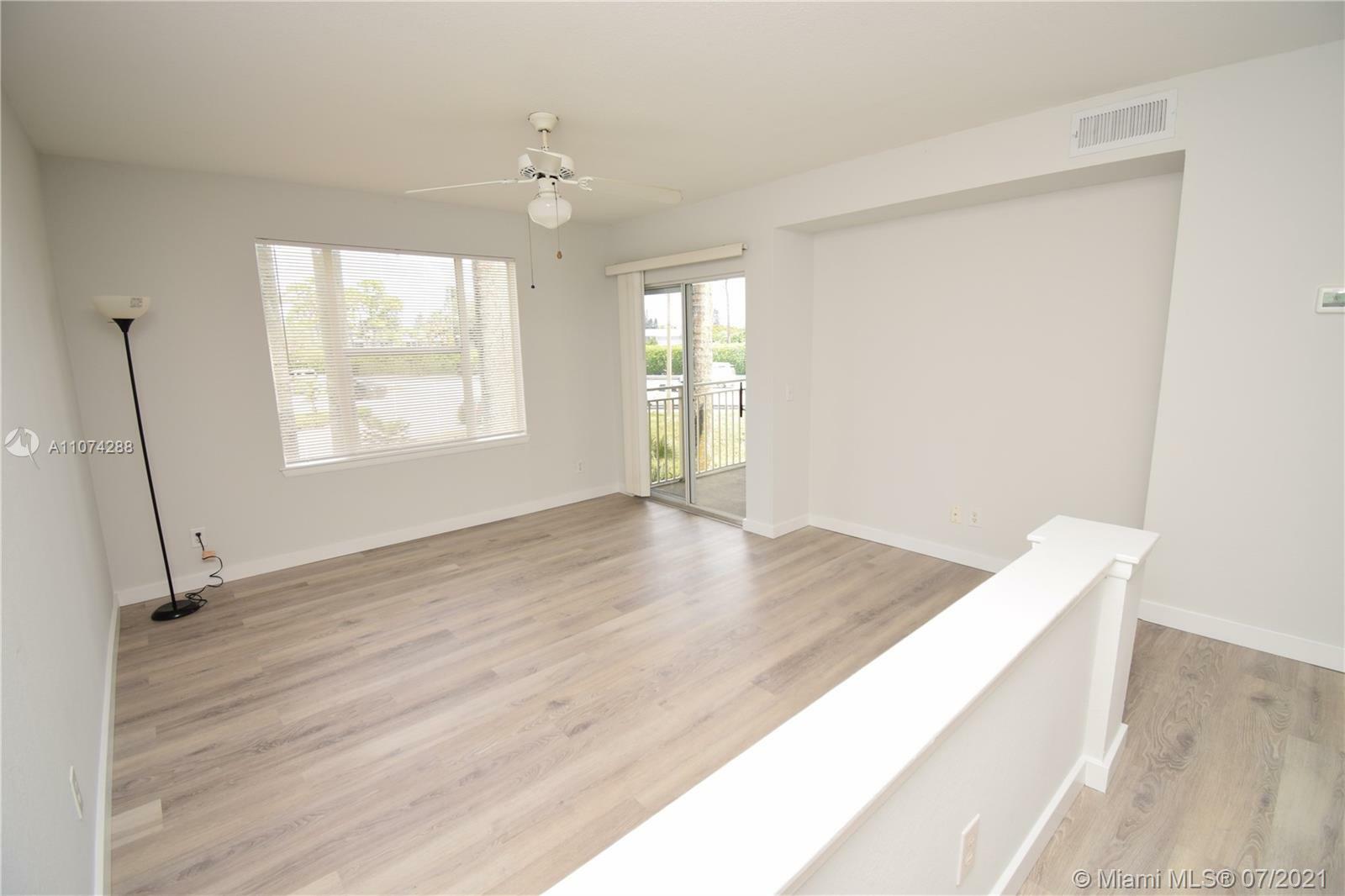 Property Photo:  1705 Palm Cove Blvd 1-207  FL 33445 