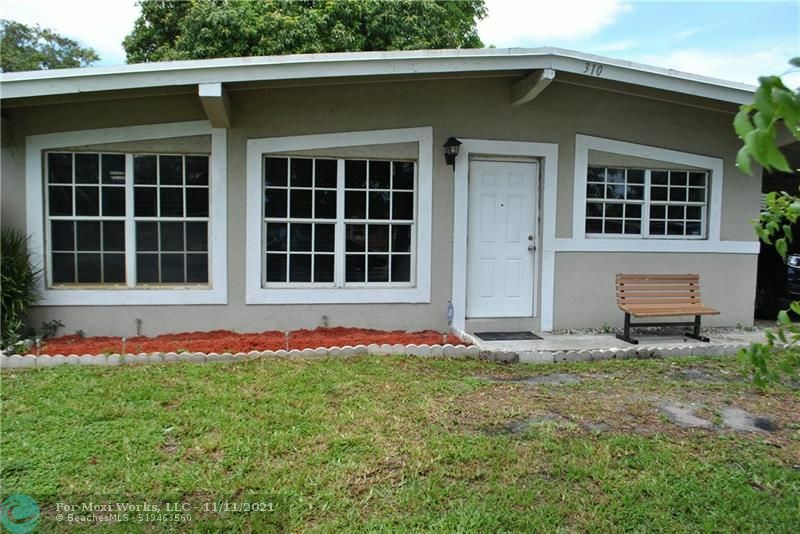 Property Photo:  310 NW 33rd Ave  FL 33311 