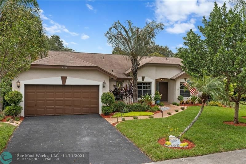 Property Photo:  5164 NW 53rd Ave  FL 33073 