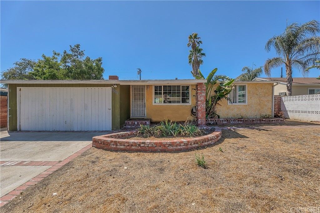 Property Photo:  8583 Sparton Avenue  CA 91331 