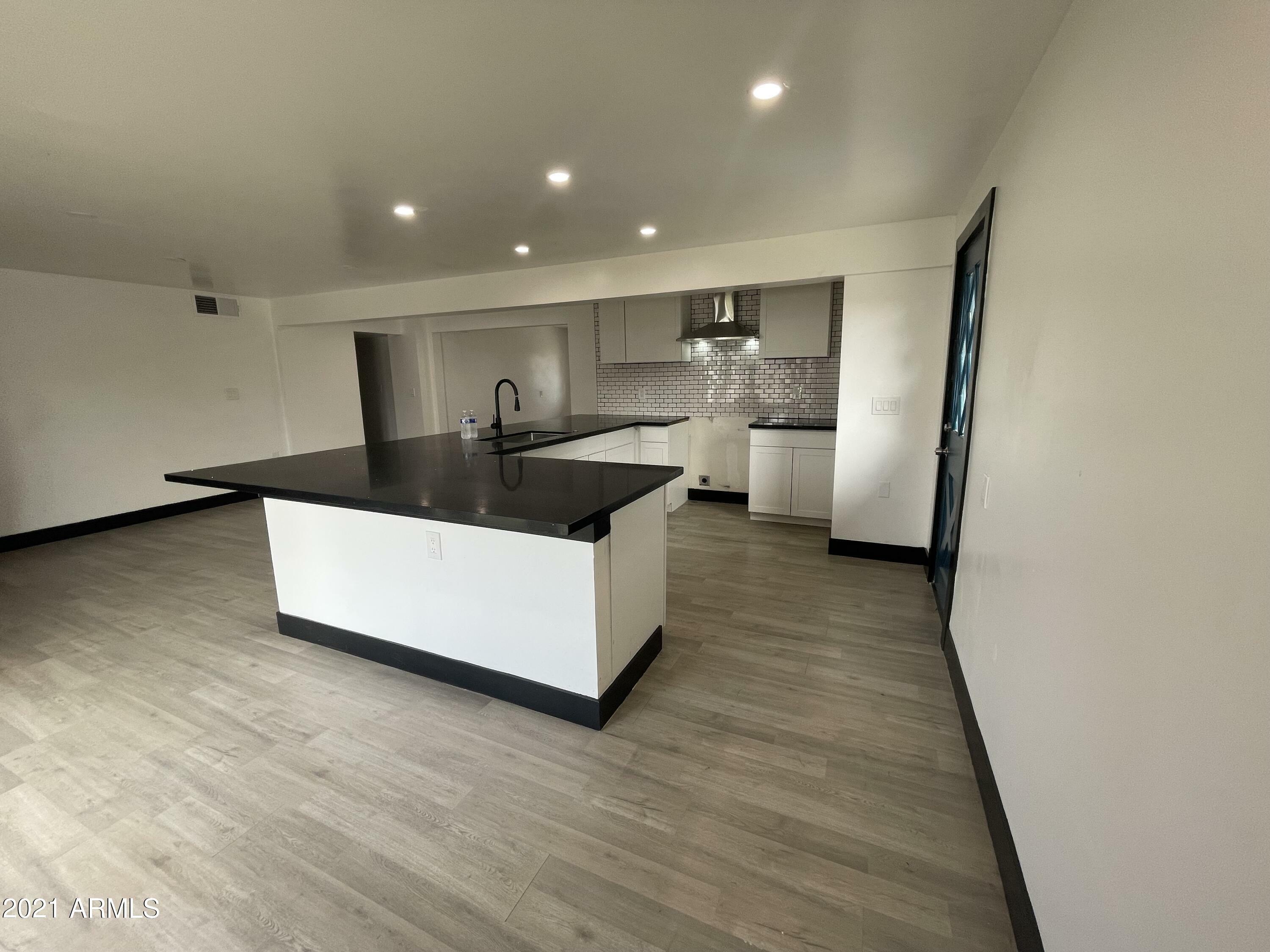 Property Photo:  5333 W Thomas Road  AZ 85031 