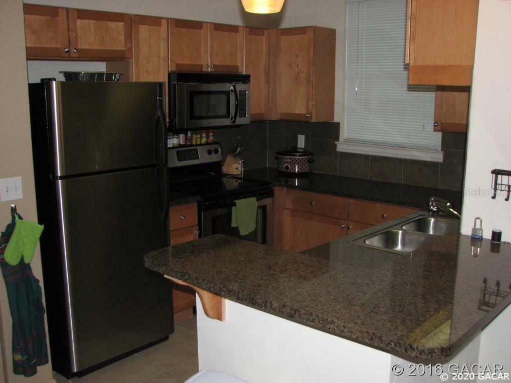 Property Photo:  3027 SW Archer Road  FL 32608 