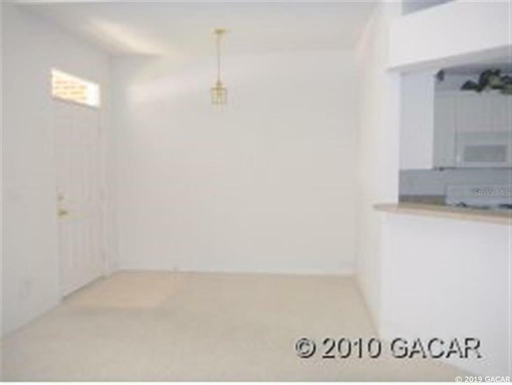 Property Photo:  4946 NW 1st Place  FL 32607 