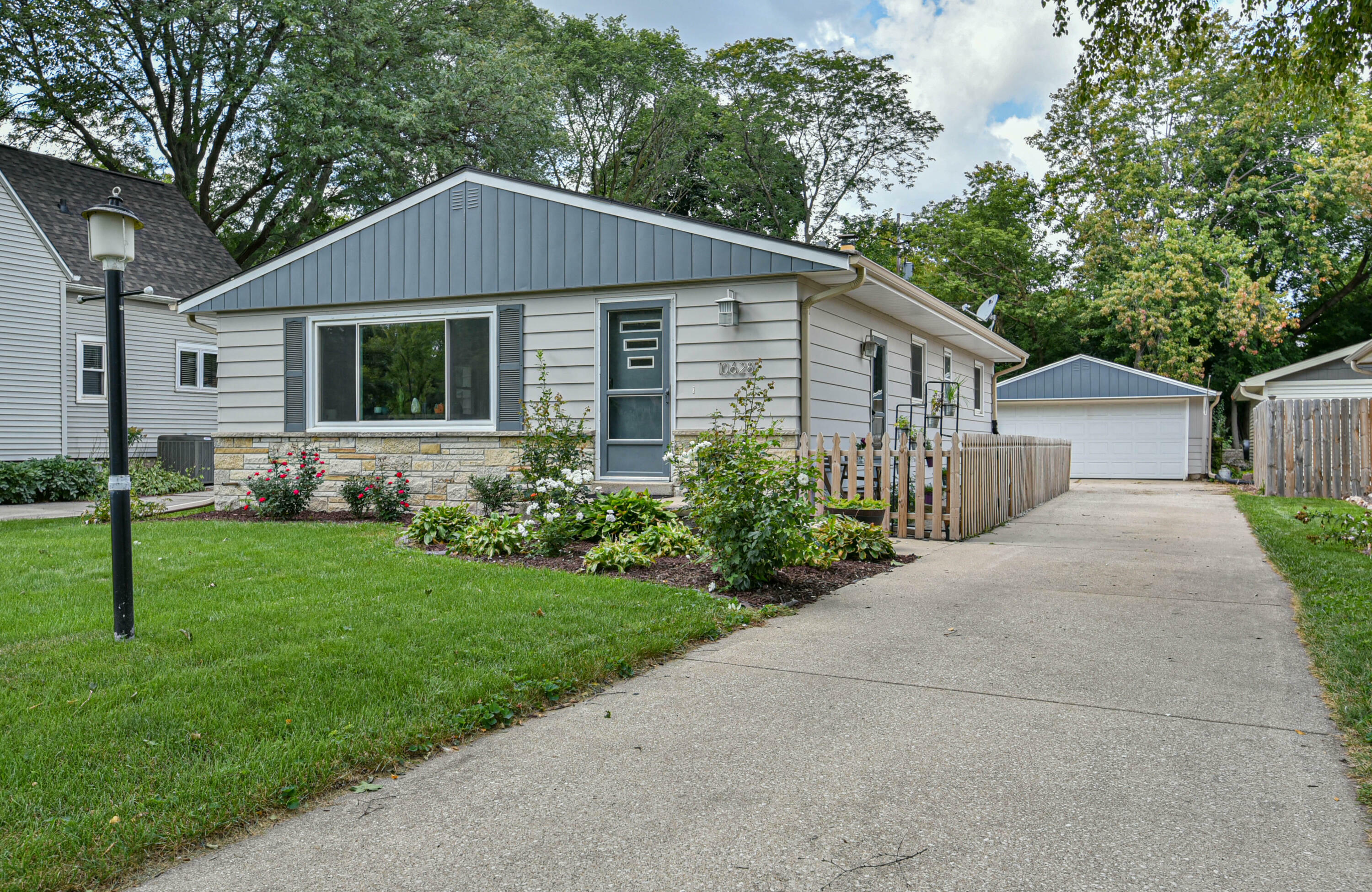 Property Photo:  10628 W Fisher Pkwy  WI 53226 