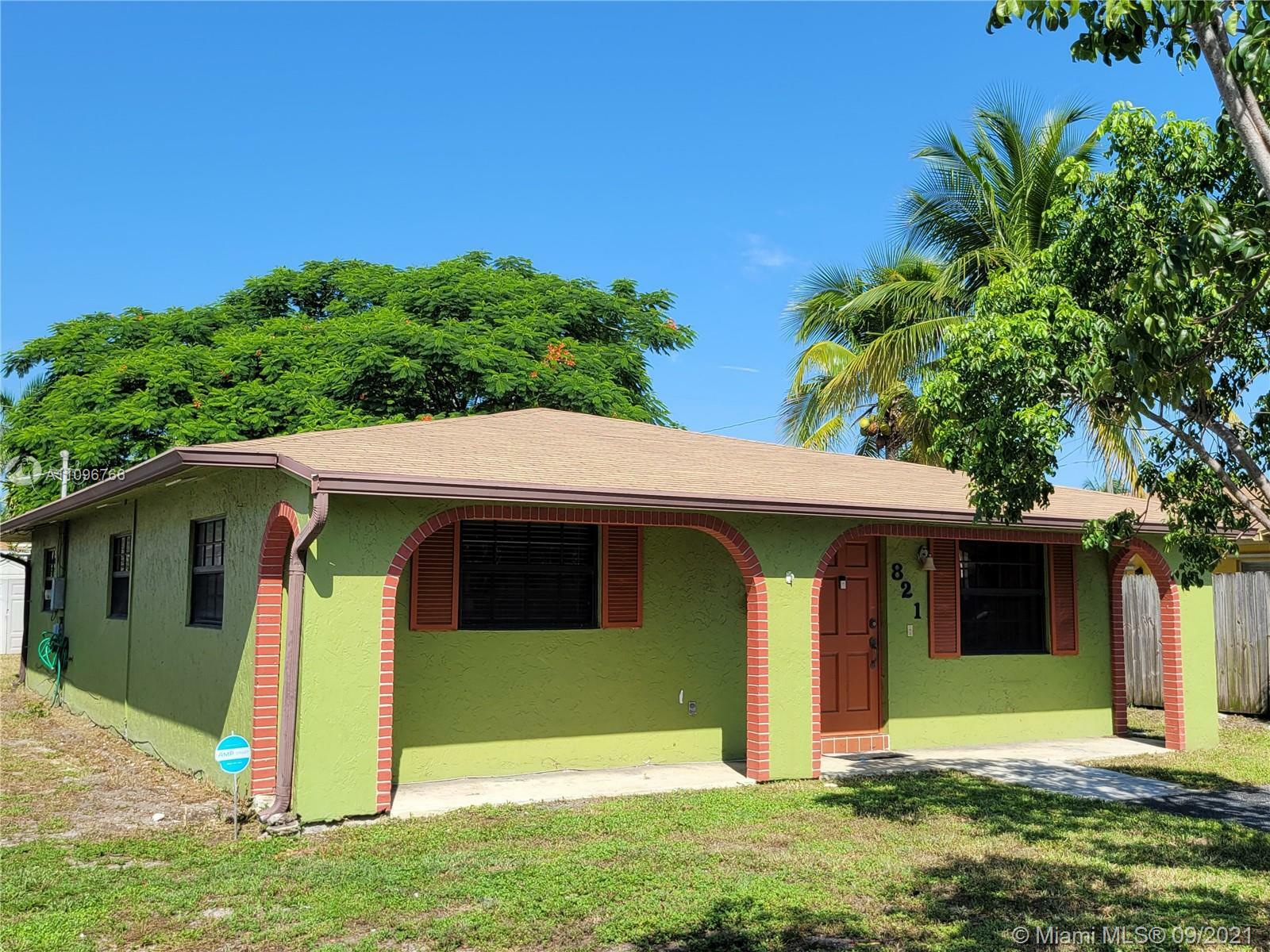 Property Photo:  821 NE 11th Ave  FL 33060 