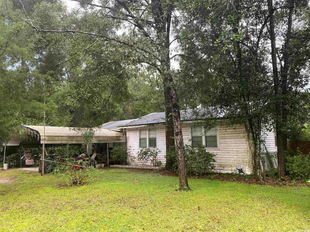 Property Photo:  219 SE 48 Street  FL 32641 