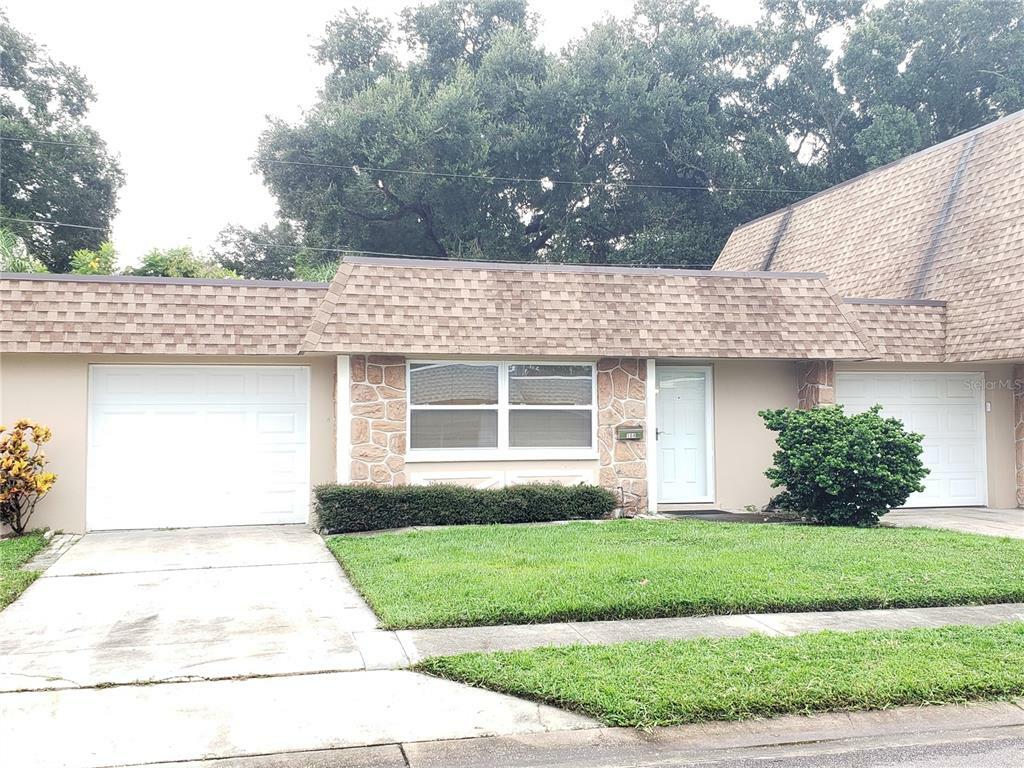 Property Photo:  104 Mindy Drive 104  FL 33771 