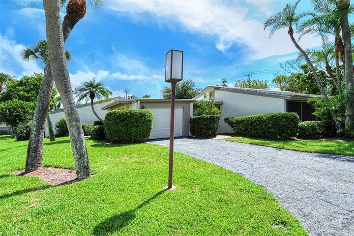 Property Photo:  130 Whispering Sands Circle V-16  FL 34242 