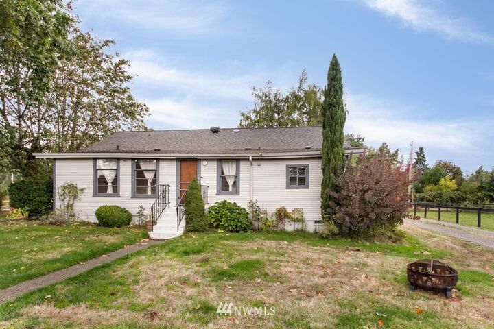 Property Photo: 8523 Riverside Drive E WA 98390