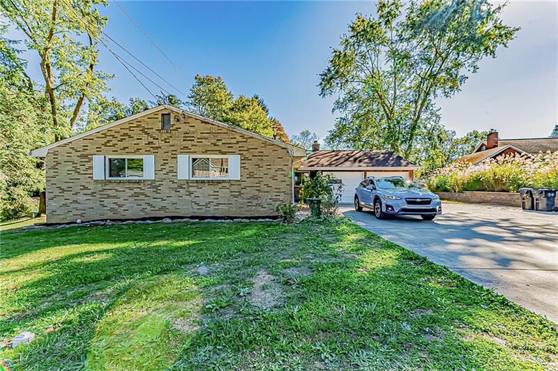 Property Photo:  1858 Sample Rd  PA 15101 