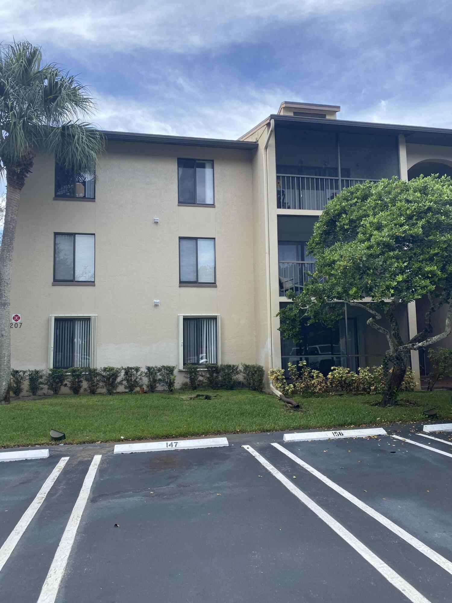 Property Photo:  207 Foxtail A1 Drive A1  FL 33415 