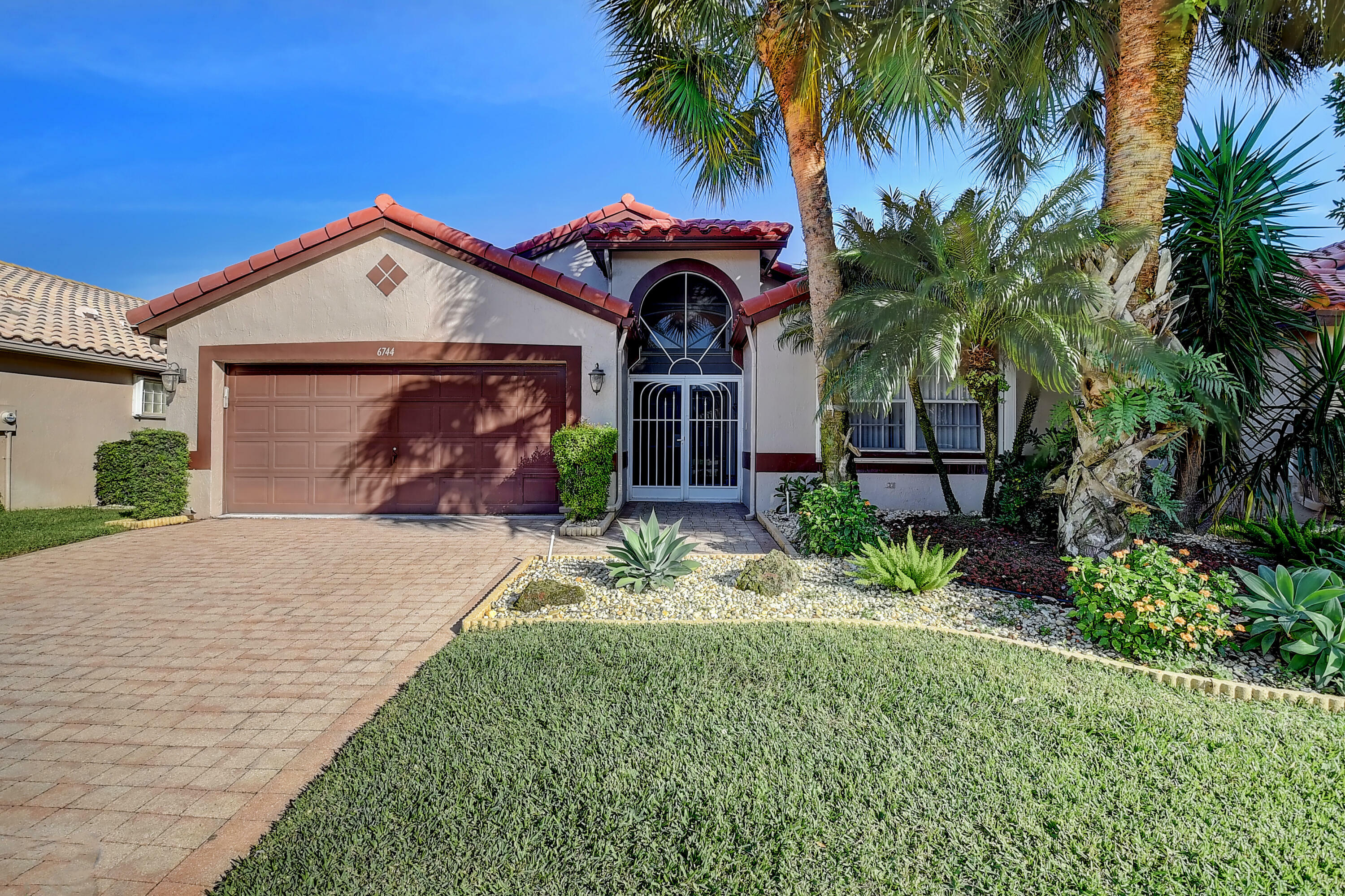 Property Photo:  6744 Sherbrook Drive  FL 33437 