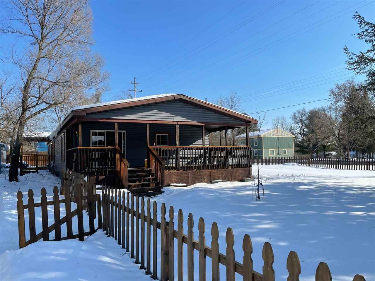 Property Photo:  209 Bowen  MI 49727 