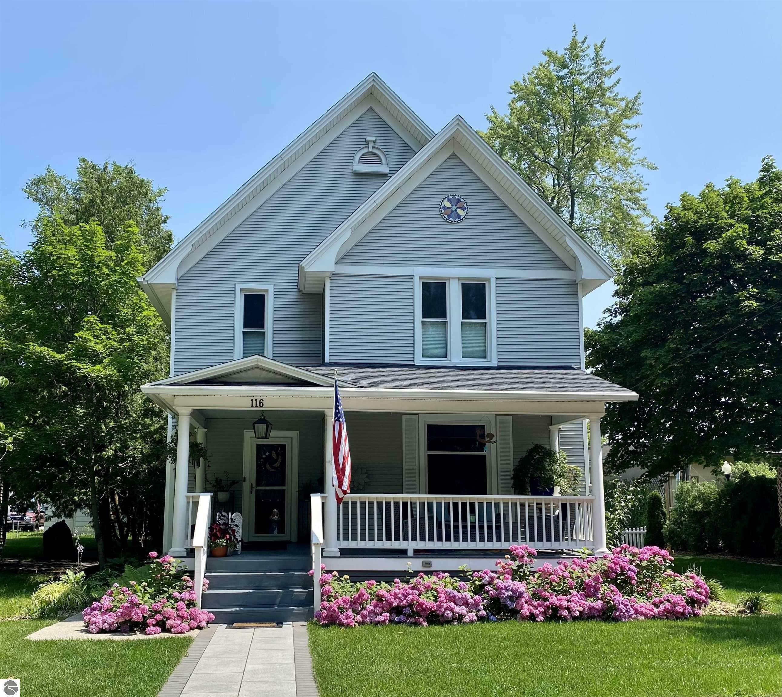 Property Photo:  116 N Oak  MI 49684 