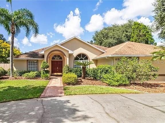 Property Photo:  6503 Longoak Court  FL 33811 