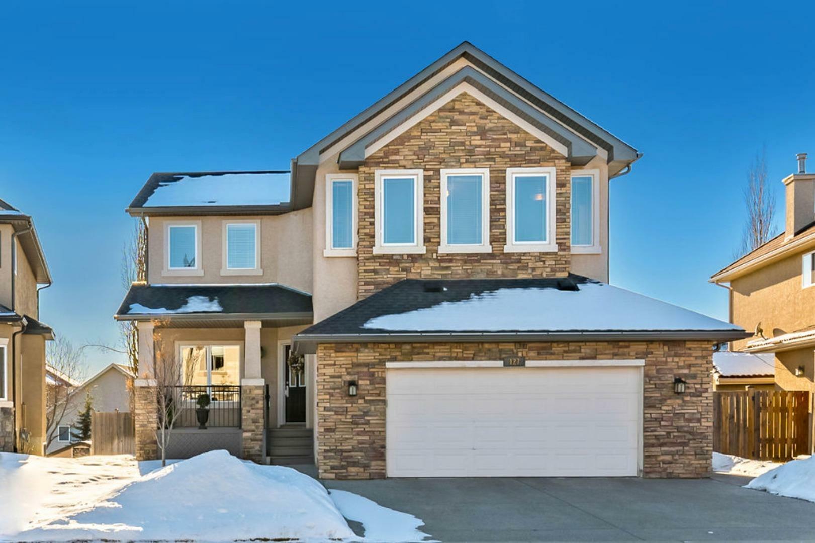 Property Photo: 127 Crystal Shores Drive AB T1S 1X8