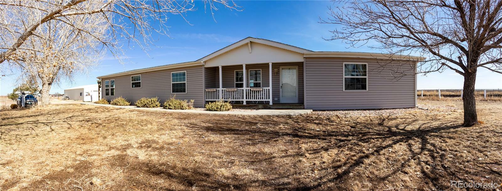 Property Photo:  12897 County Road 40  CO 80651 
