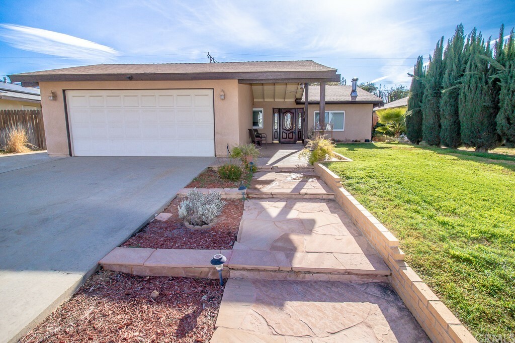 Property Photo:  13573 San Juan Avenue  CA 92399 