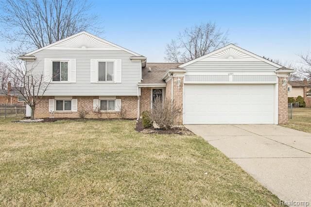 Property Photo: 6335 Raintree Drive MI 48187