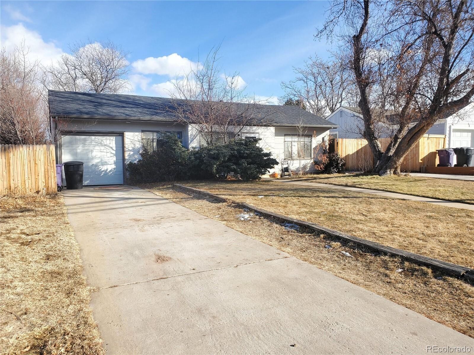 Property Photo:  3248 S Dahlia St  CO 80222 