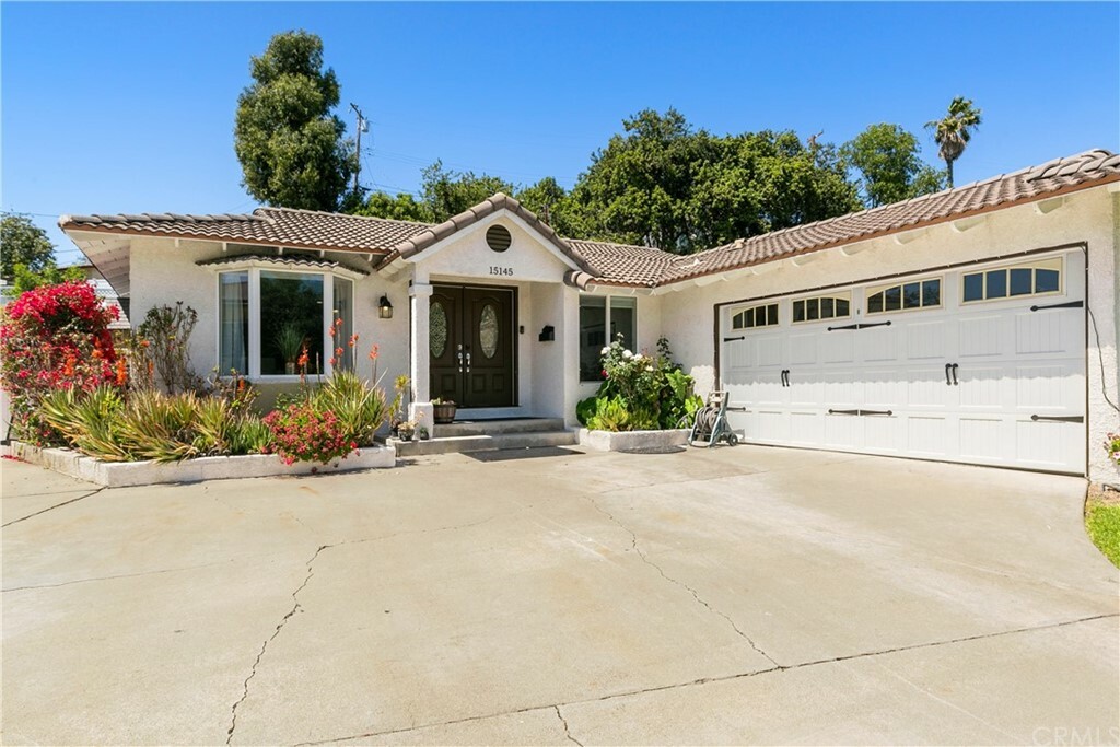 Property Photo:  15145 Las Flores Avenue  CA 90638 