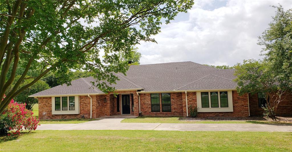 Property Photo: 202 Windy Lane TX 75087