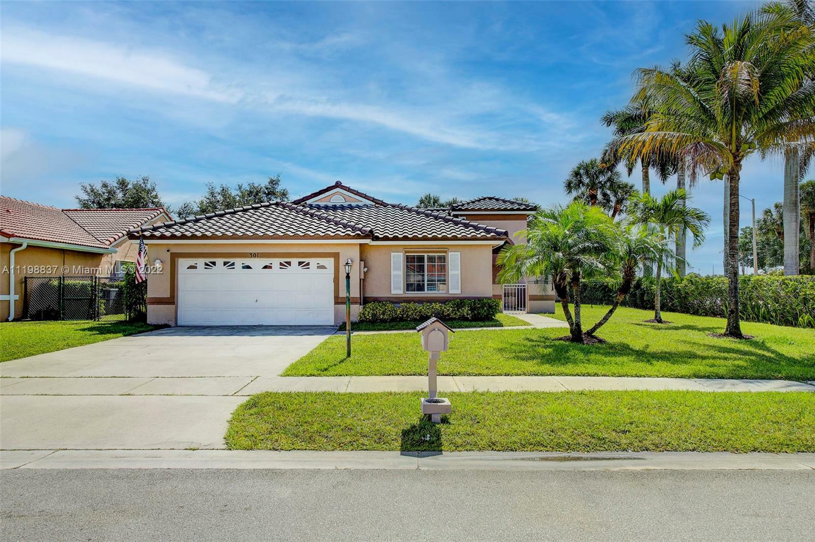 Property Photo:  301 NW 187th Ave  FL 33029 