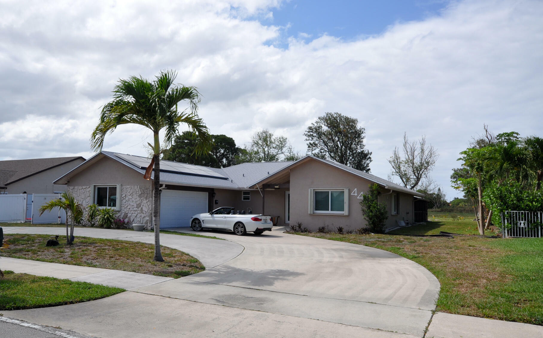 Property Photo:  441 NW 53rd Street  FL 33487 