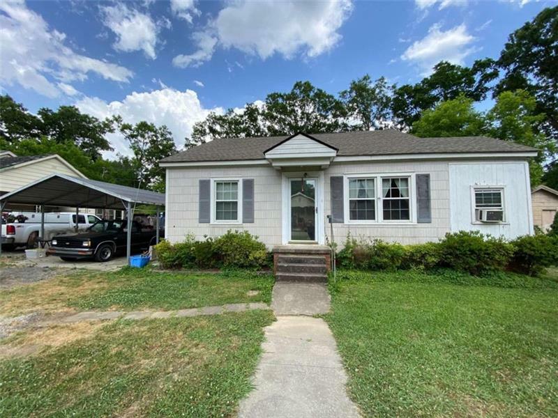 Property Photo:  555 1st St NE  GA 30161 