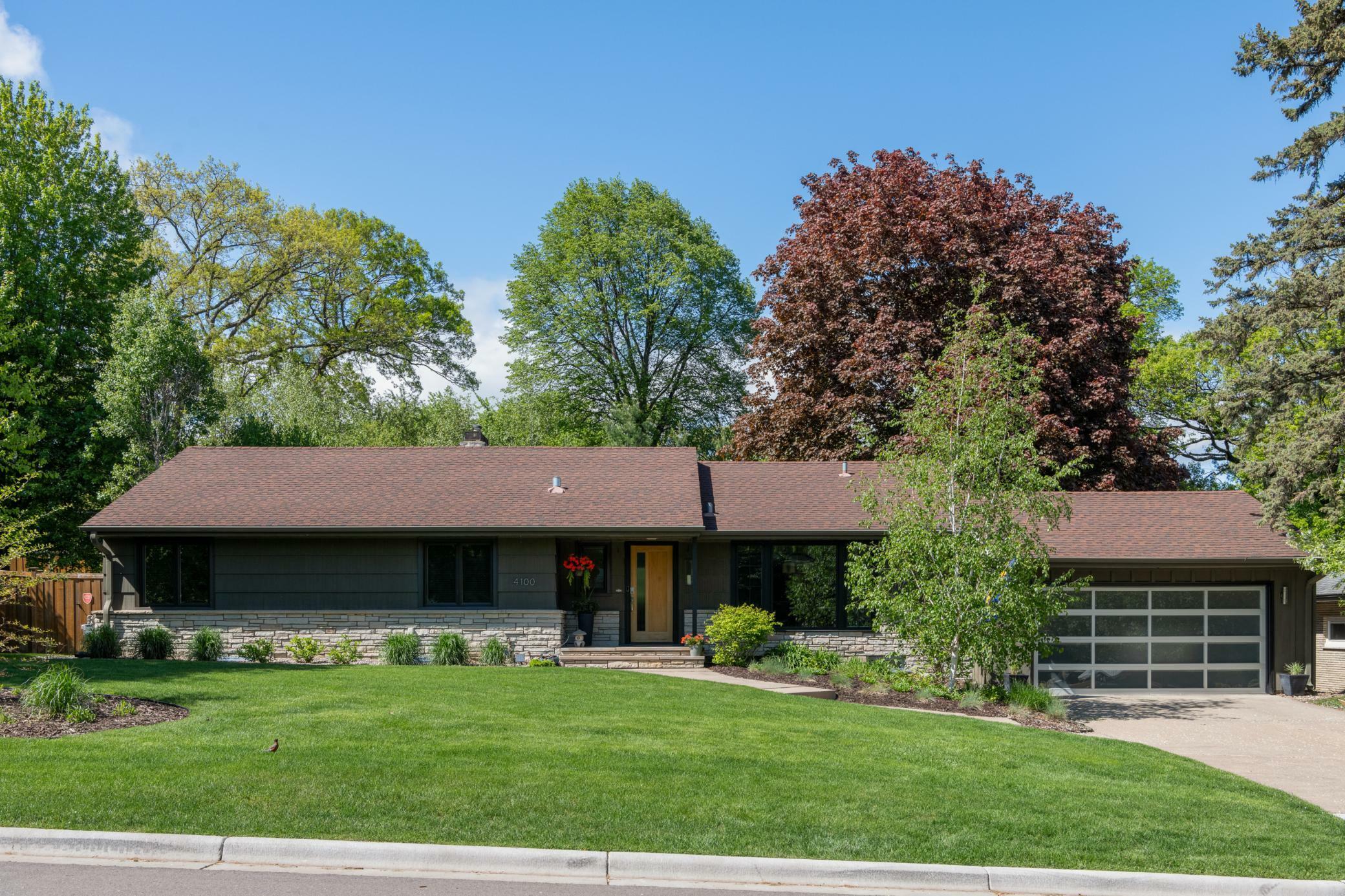 Property Photo:  4100 Basswood Road  MN 55416 