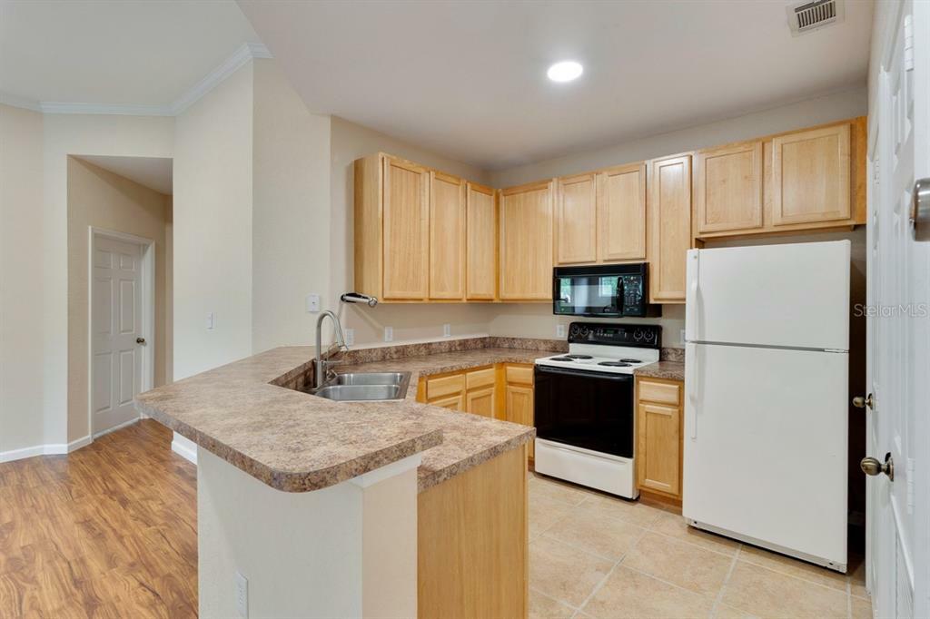 Property Photo:  10201 Courtney Palms Boulevard 303  FL 33619 