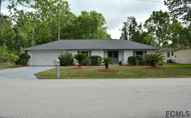 Property Photo:  97 Zephyr Lily Trail  FL 32164 