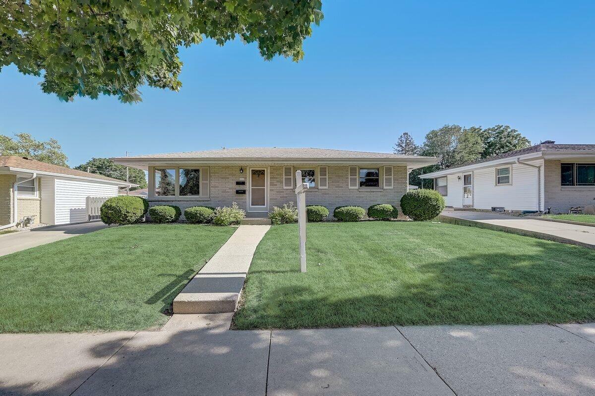 Property Photo:  8519 W Crawford Ave  WI 53228 