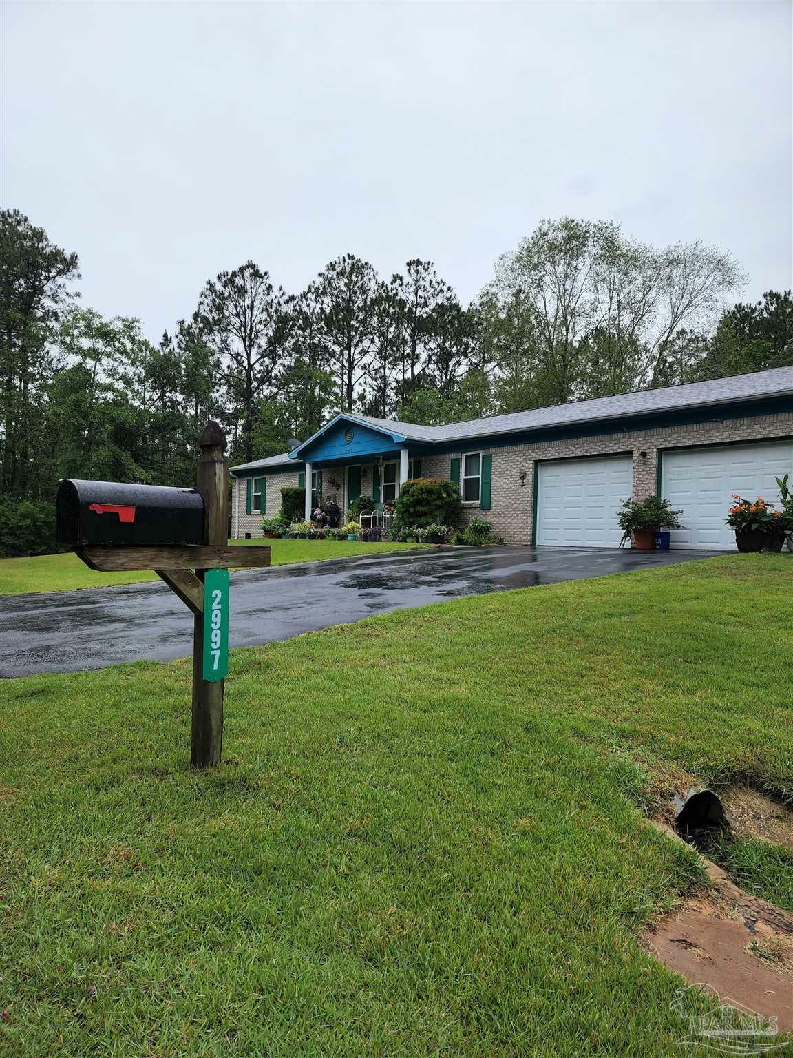 Property Photo:  2997 N 34th Ave  FL 32583 