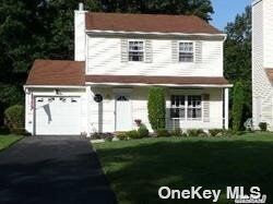 Property Photo:  12 Thrush Path  NY 11727 