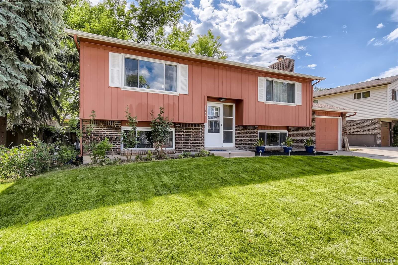 Property Photo:  6227 S Dover Street  CO 80123 